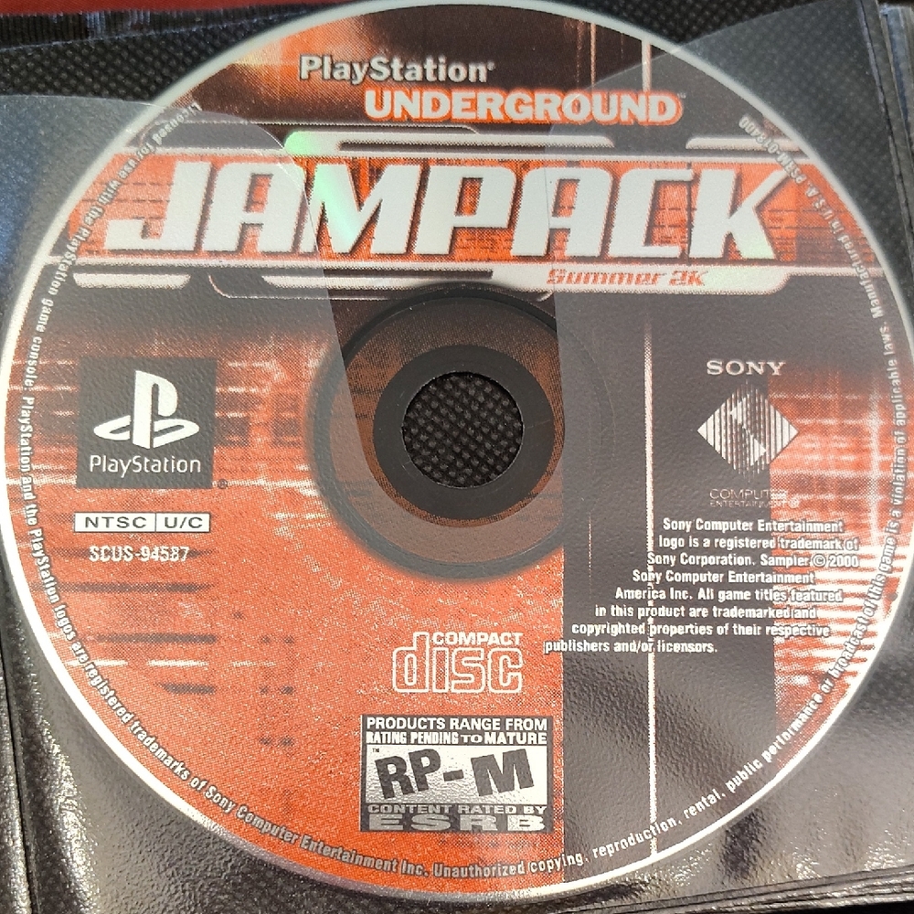 Sony PlayStation Jampack Summer 2K Disc - Red and Black